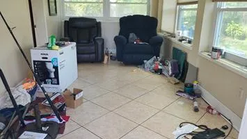 Crew loading furniture during move out junk removal in Gainesville FL before a walkthrough